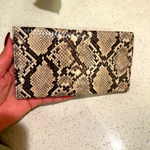 Jessica Simpson - snakeskin print with logo and stud embellishments. - Picture 2 of 5